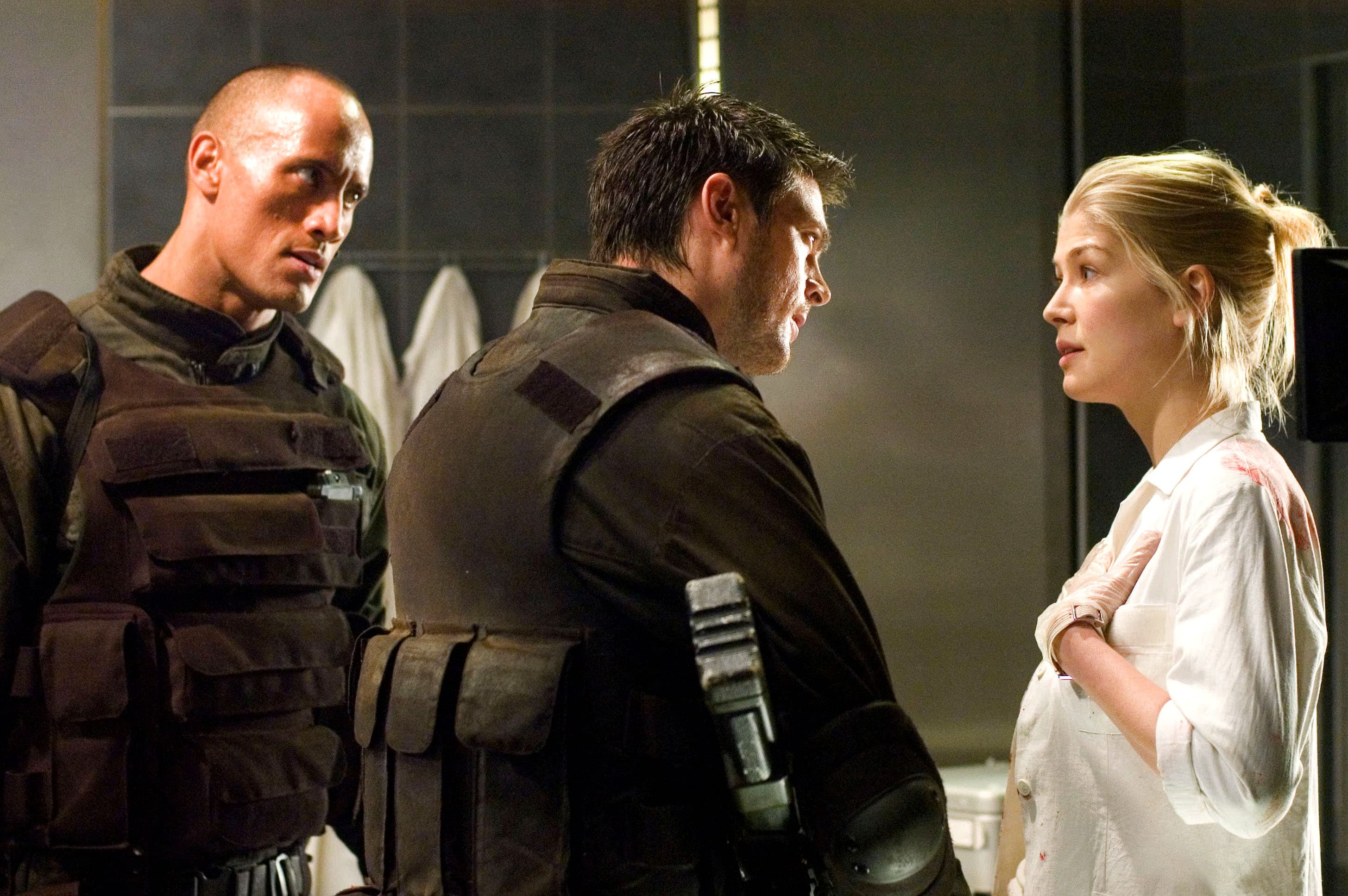 Rosamund Pike Says Her 2005 ‘Doom’ Movie With Dwayne Johnson Is ‘One of the Worst Films Ever Made’ and ‘Could’ve Ended My Career’