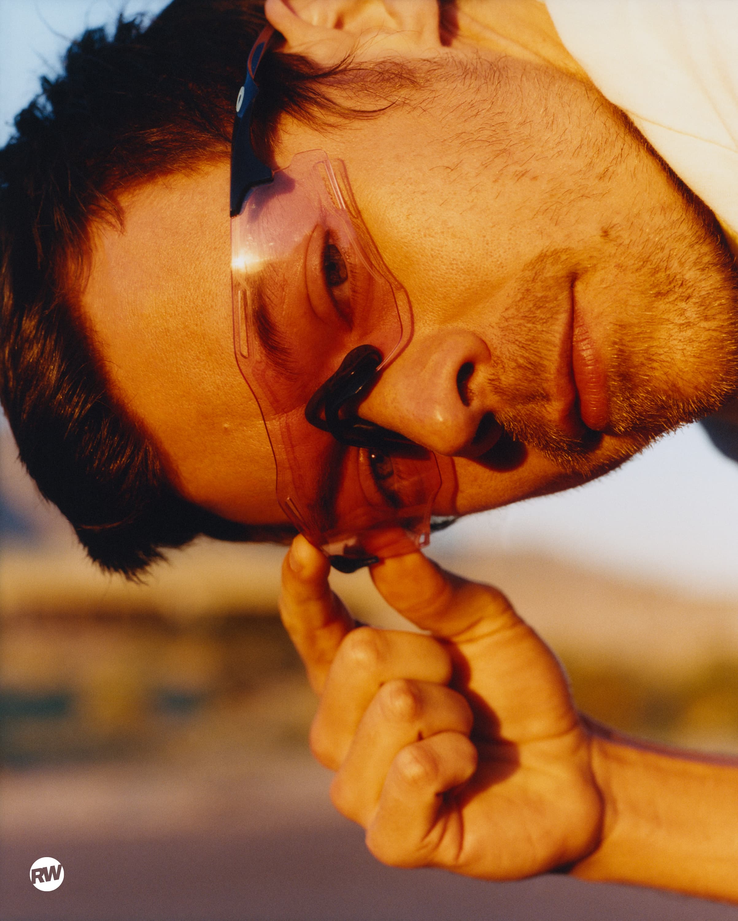 Harry Styles’ Running Essentials? Nike Revolutions and Oakley Sunglasses, Apparently