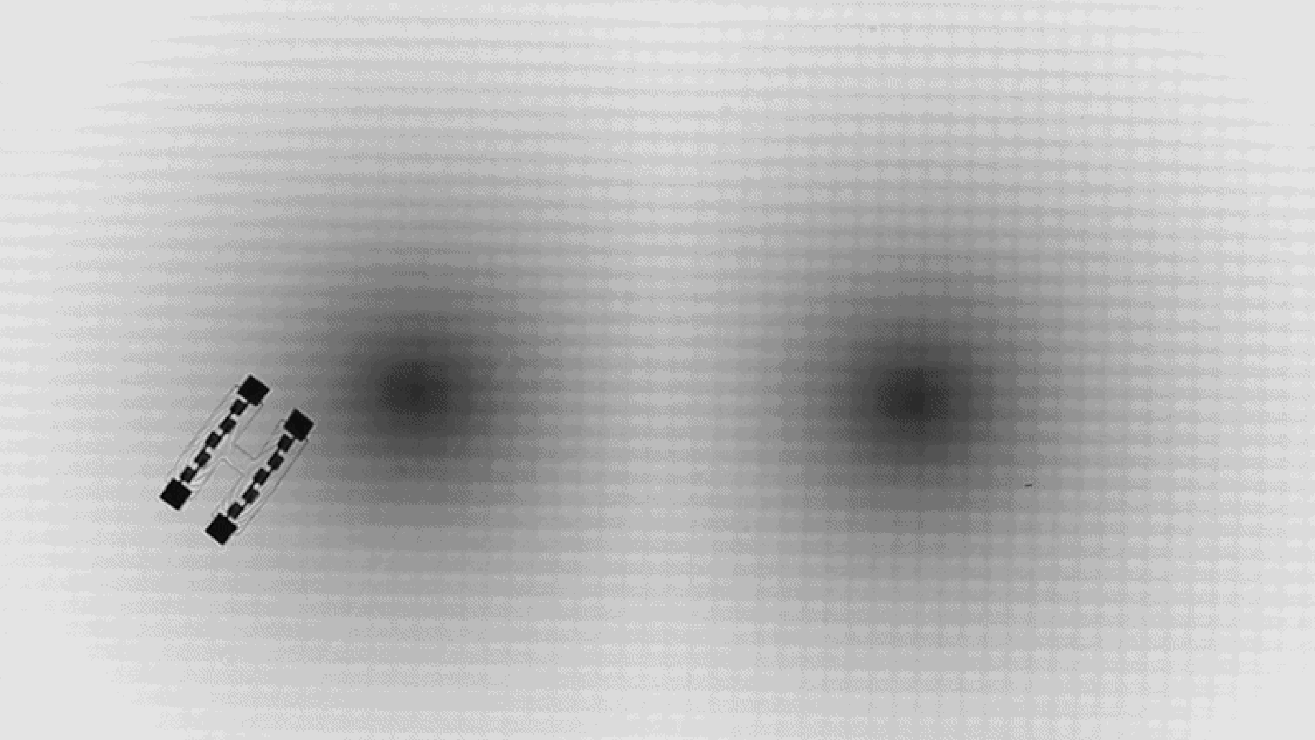 These tiny swimming robots can navigate 'artificial space-time' mazes using Einstein's relativity