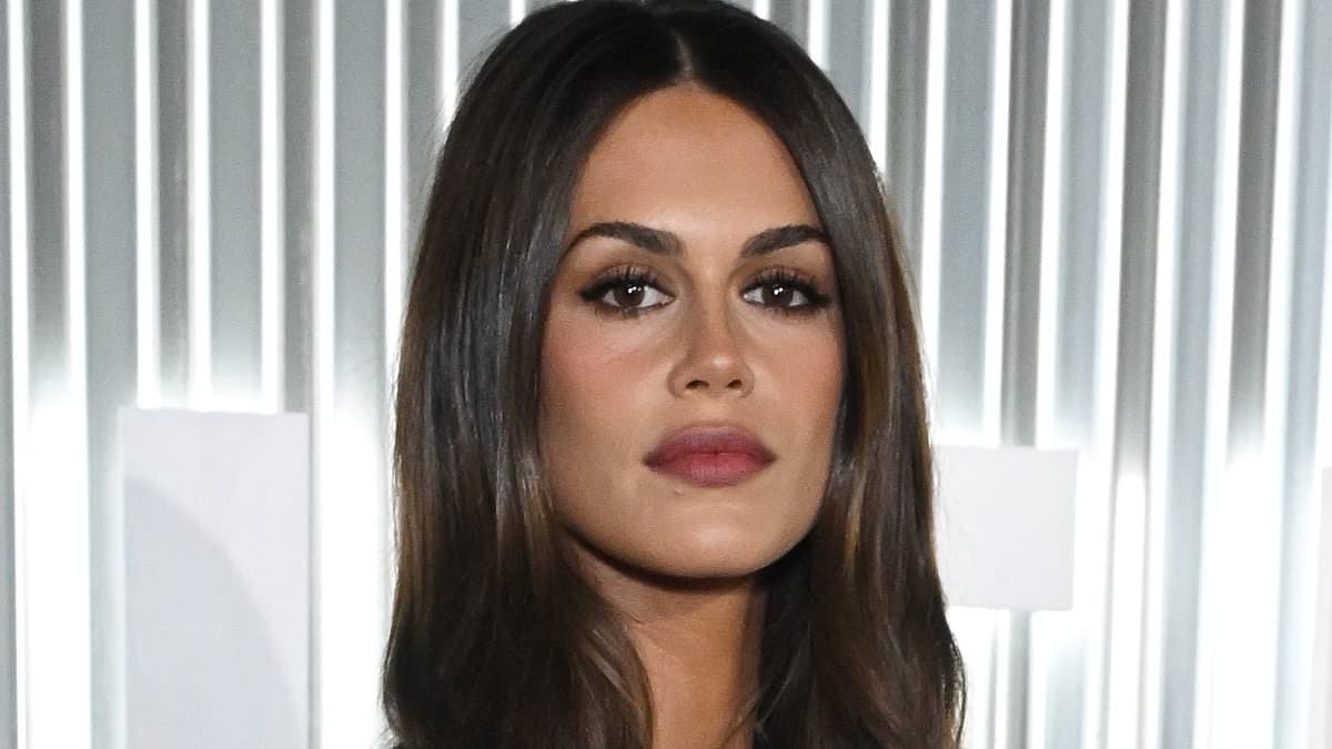 Kaia Gerber takes the plunge in VERY low-cut dress as she joins fellow nepo baby Paris Jackson at Vanity Fair's Young Hollywood party