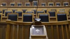 Four convicted over spyware scandal that shook Greece