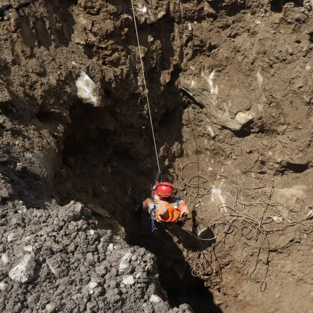 Rescue workers are operating at affected hydropower sites to try to find trapped workers. (Reuters)